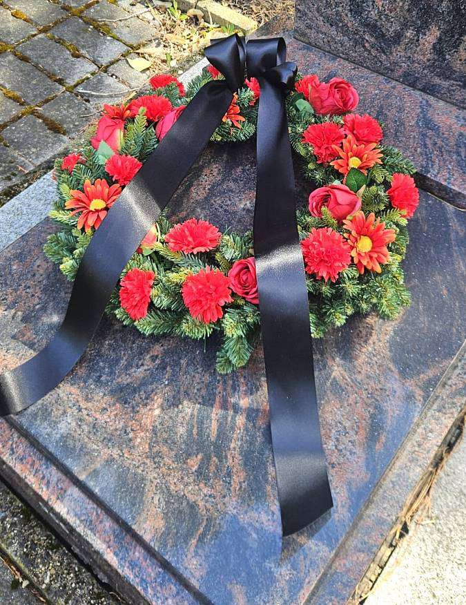 Artificial red wreath Roses and carnations